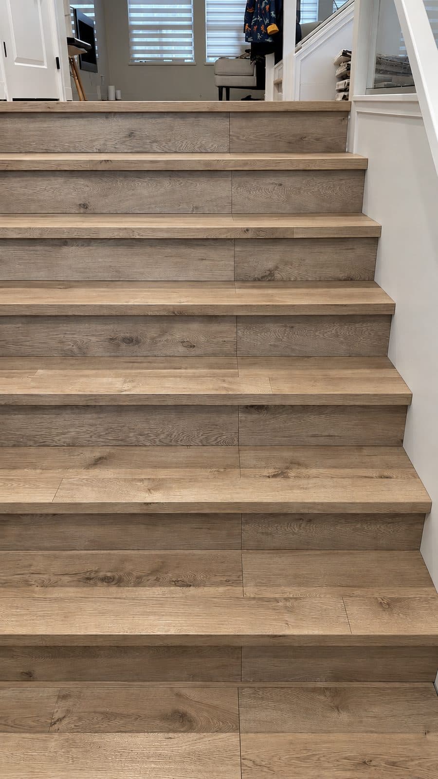 Straight staircase with matching wood treads and risers