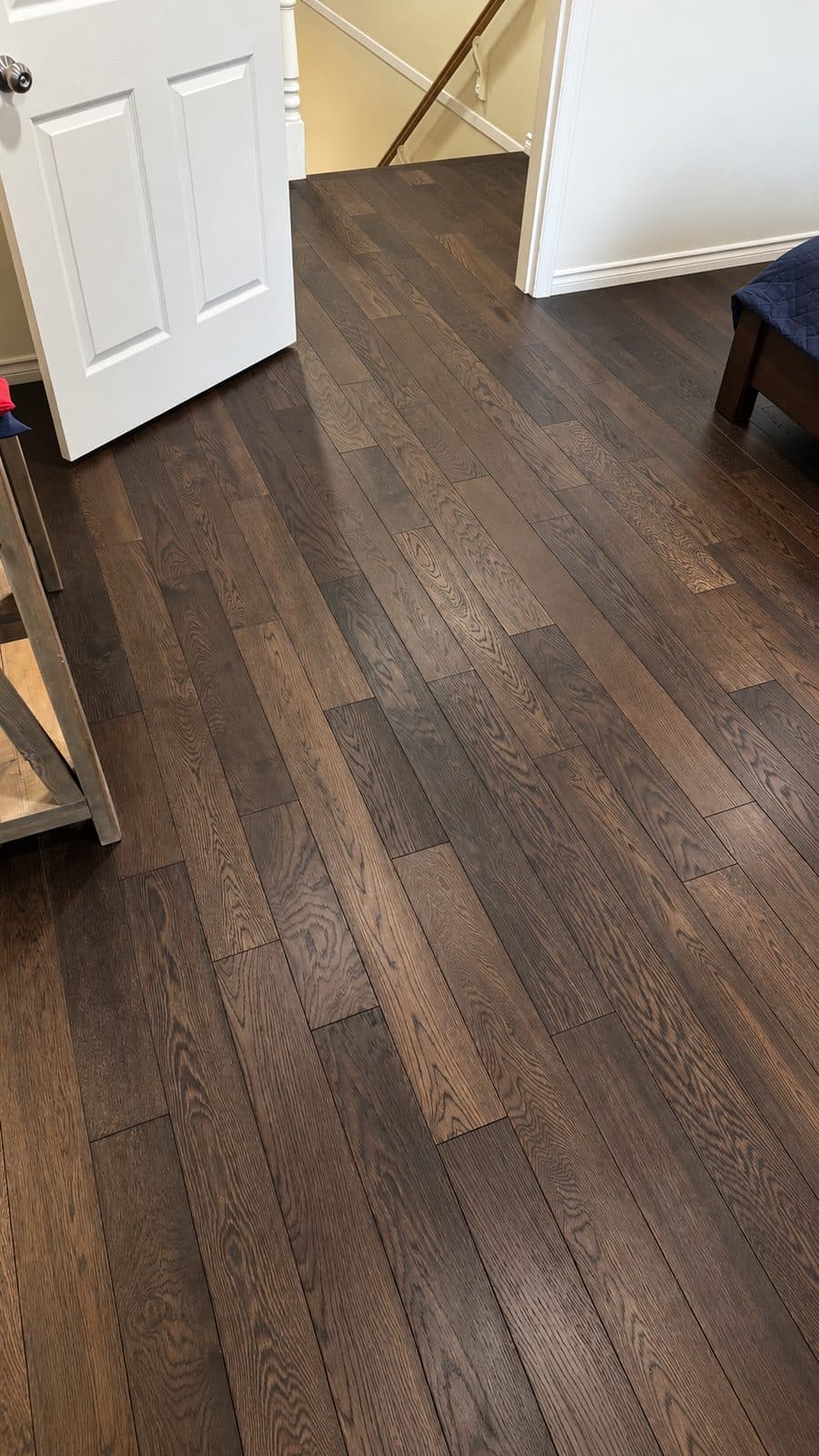 Dark wide-plank wood floor