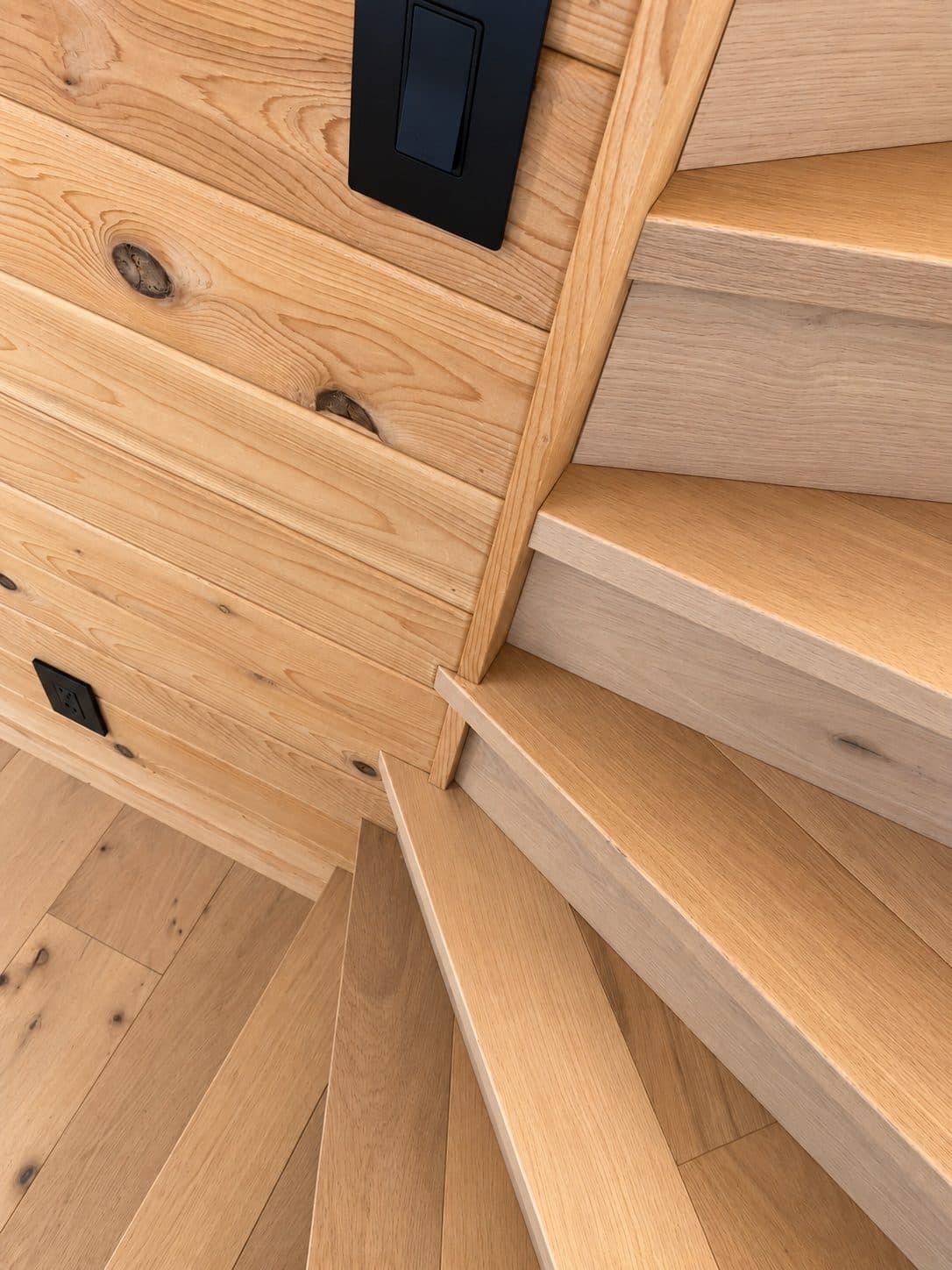 Close-up of square nosings on a winding staircase
