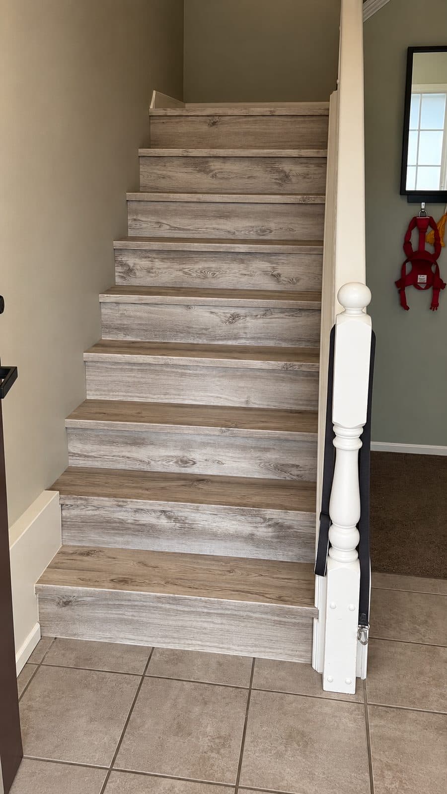 Staircase with rustic grey wood treads